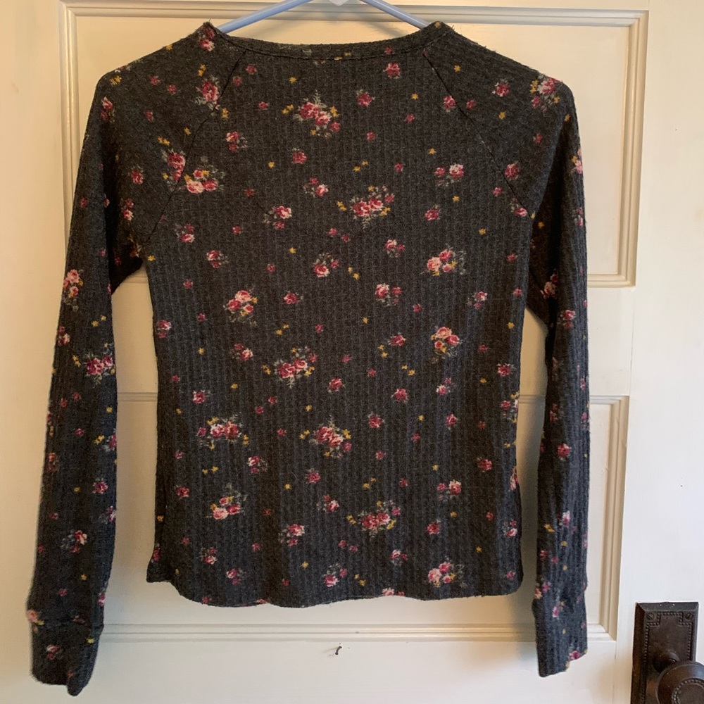 Floral long sleeve shirt.
